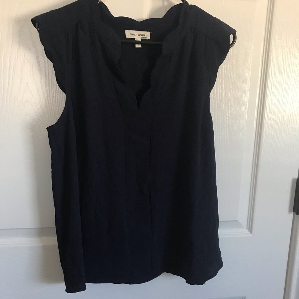 Navy blouse with scalloped neckline